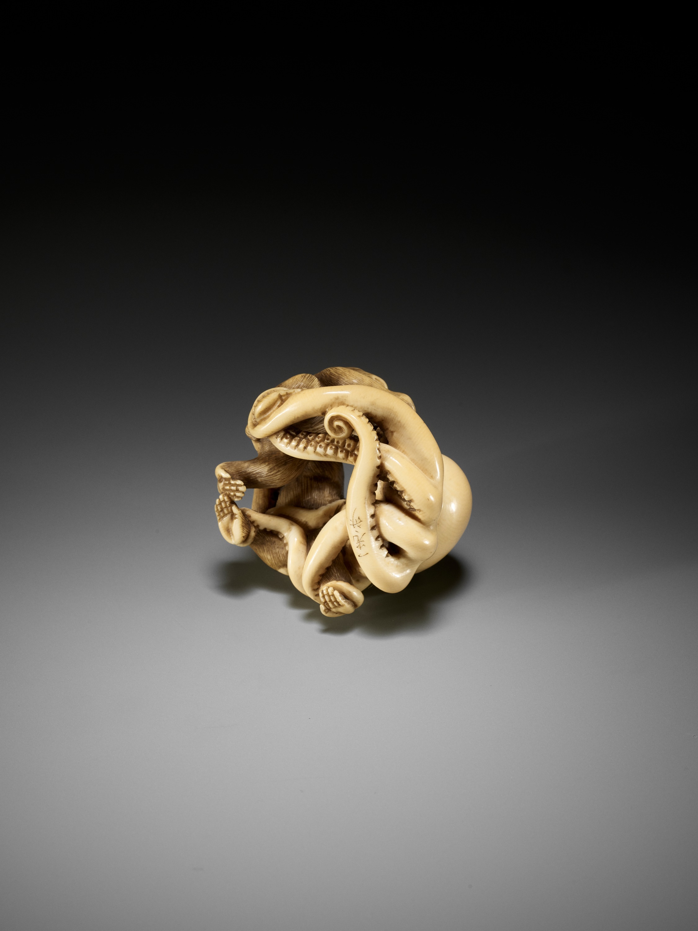 IKKOSAI: A SUPERB IVORY NETSUKE OF TWO MONKEYS FIGHTING AN OCTOPUS - Image 14 of 15