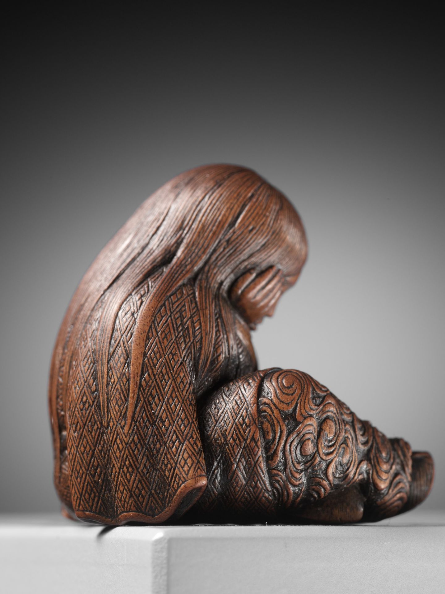 TADATOSHI: A SUPERB NAGOYA SCHOOL WOOD NETSUKE OF A SLEEPING SHOJO - Image 6 of 13