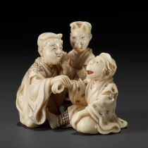 MORITA SOKO: A FINE IVORY NETSUKE DEPICTING THREE ACTORS