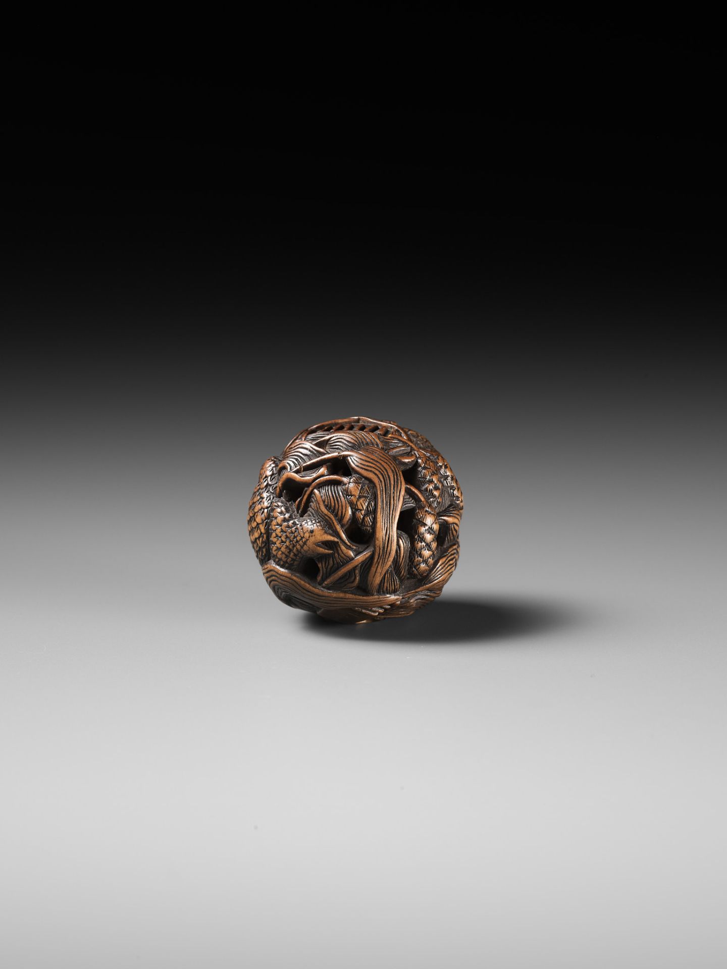 MASANAO: A FINE WOOD NETSUKE DEPICTING AN AUTUMNAL SCENE OF QUAILS AND MILLET - Image 4 of 14