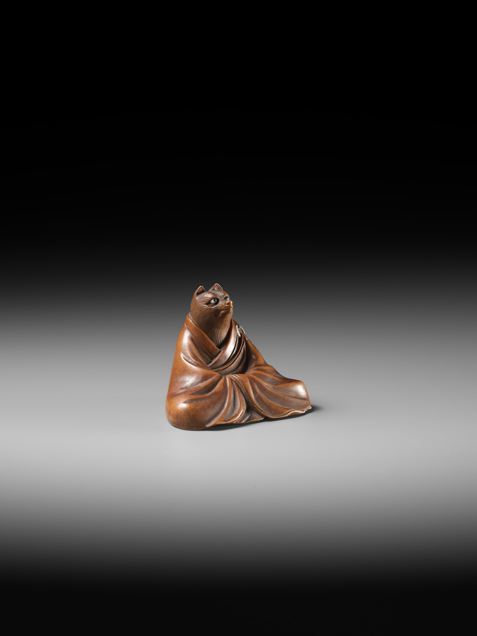 ANRAKU: A FINE AND HUMOROUS WOOD NETSUKE OF TANUKI DISGUISED AS A PRIEST - Image 11 of 14