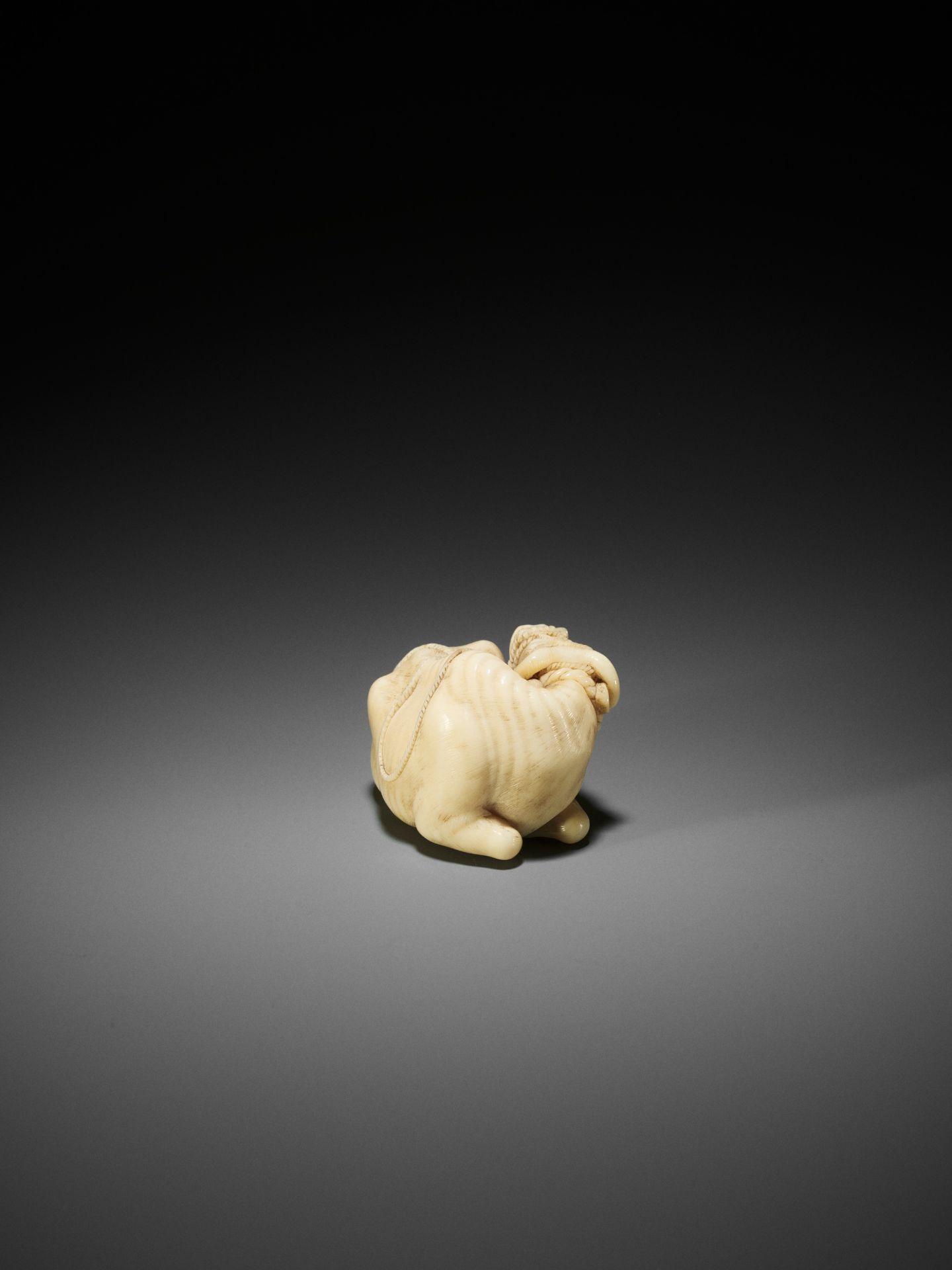 KAIGYOKUSAI MASATSUGU: A MASTERFUL AND IMPORTANT IVORY NETSUKE OF A RECUMBENT OX - Image 18 of 30