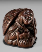 MASAHIRO: A WOOD NETSUKE OF SOTOBA KOMACHI