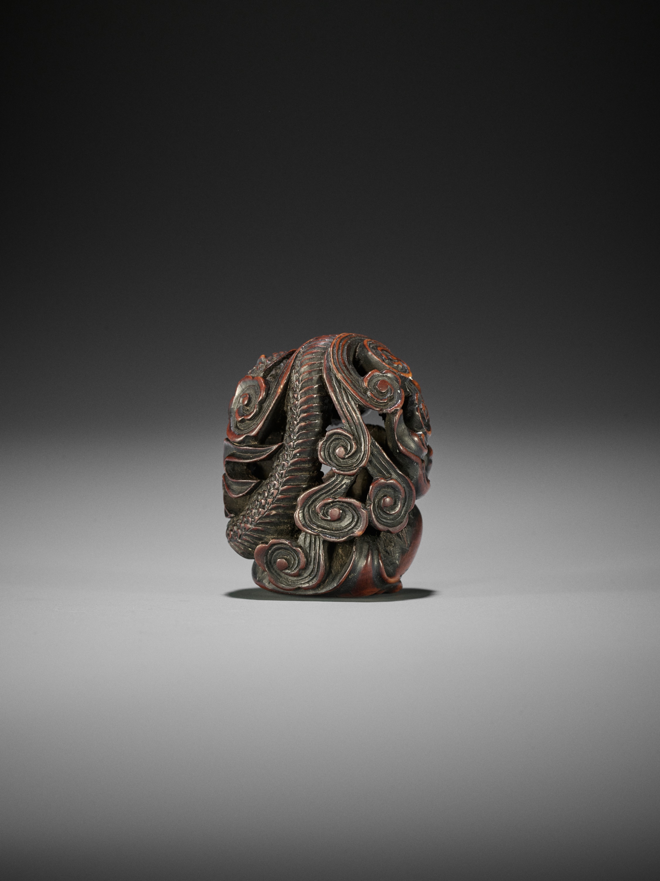 SADAKATA: A SUPERB WOOD NETSUKE OF RAKAN HANDAKA SONJA WITH DRAGON - Image 3 of 15