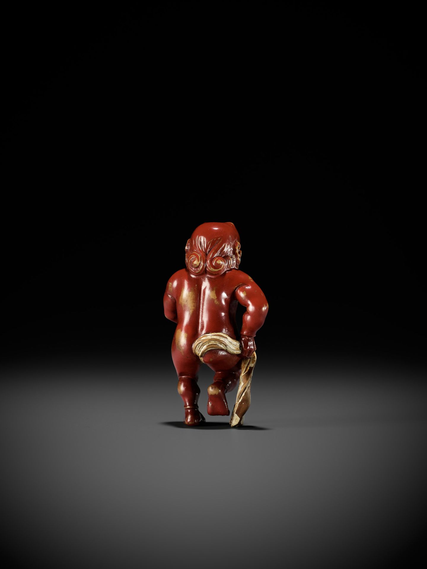 A RARE LACQUERED WOOD NETSUKE OF AN ONI TYING HIS FUNDOSHI - Image 3 of 12