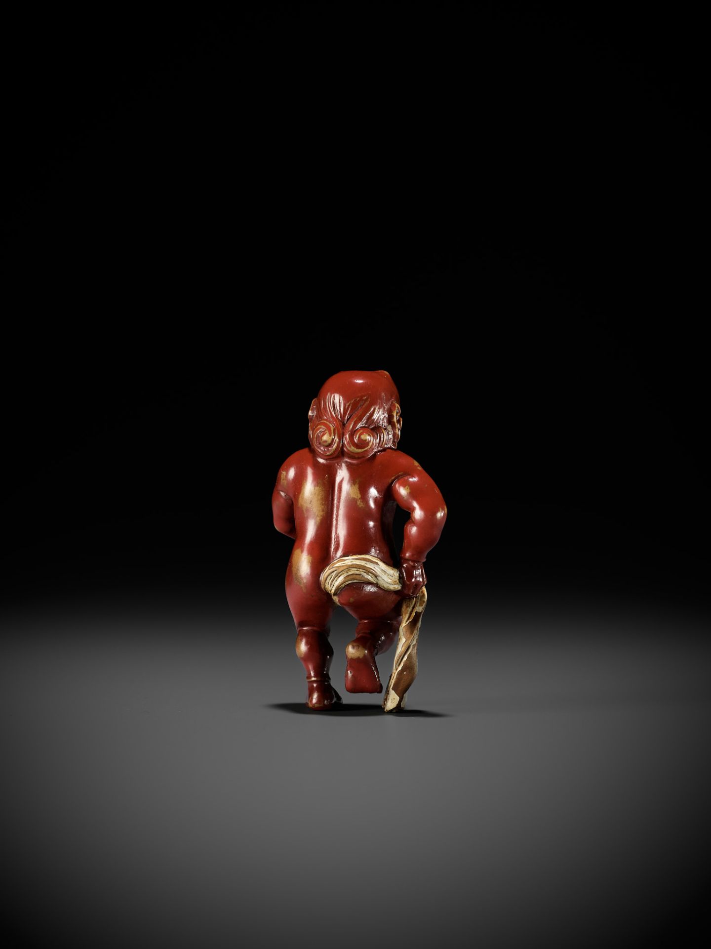 A RARE LACQUERED WOOD NETSUKE OF AN ONI TYING HIS FUNDOSHI - Bild 3 aus 12