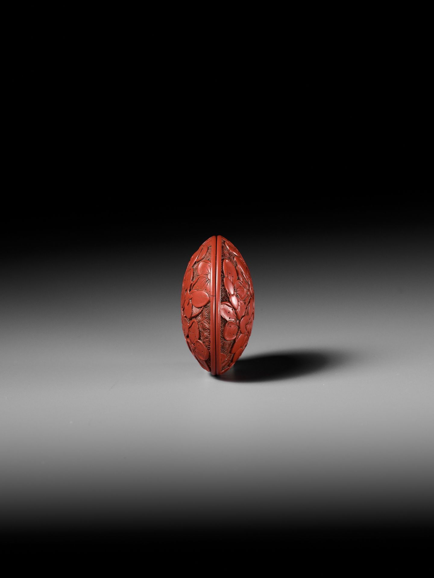 A FINE TSUISHU (CARVED RED LACQUER) MANJU NETSUKE WITH PEACH BLOSSOMS - Image 10 of 13