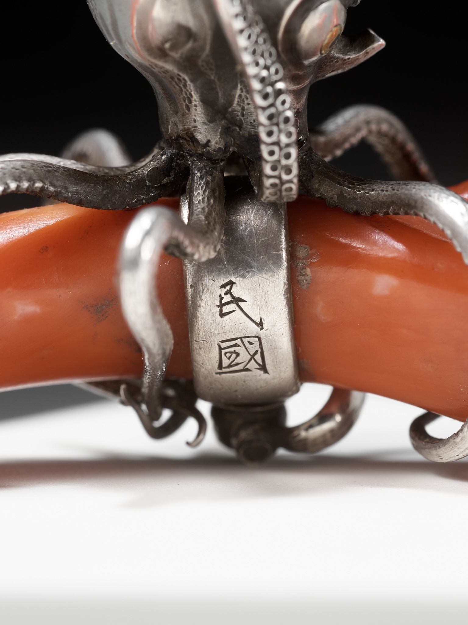 MINKOKU: A LARGE SILVER NETSUKE OF AN OCTOPUS GRASPING A PIECE OF CORAL - Image 14 of 14