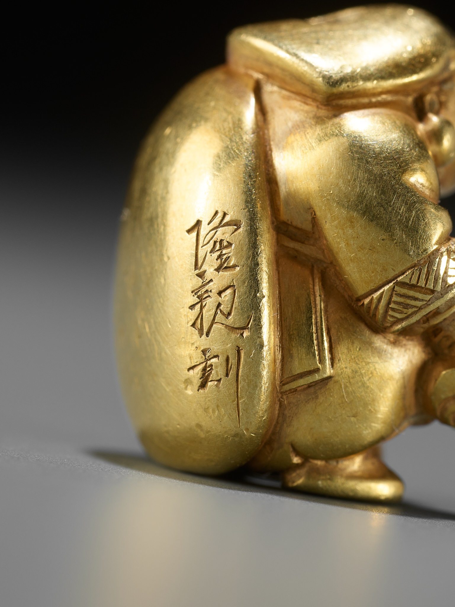 TAKACHIKA: A VERY RARE SOLID GOLD OJIME SET OF THE SEVEN LUCKY GODS (SHICHIFUKUJIN) - Image 58 of 61