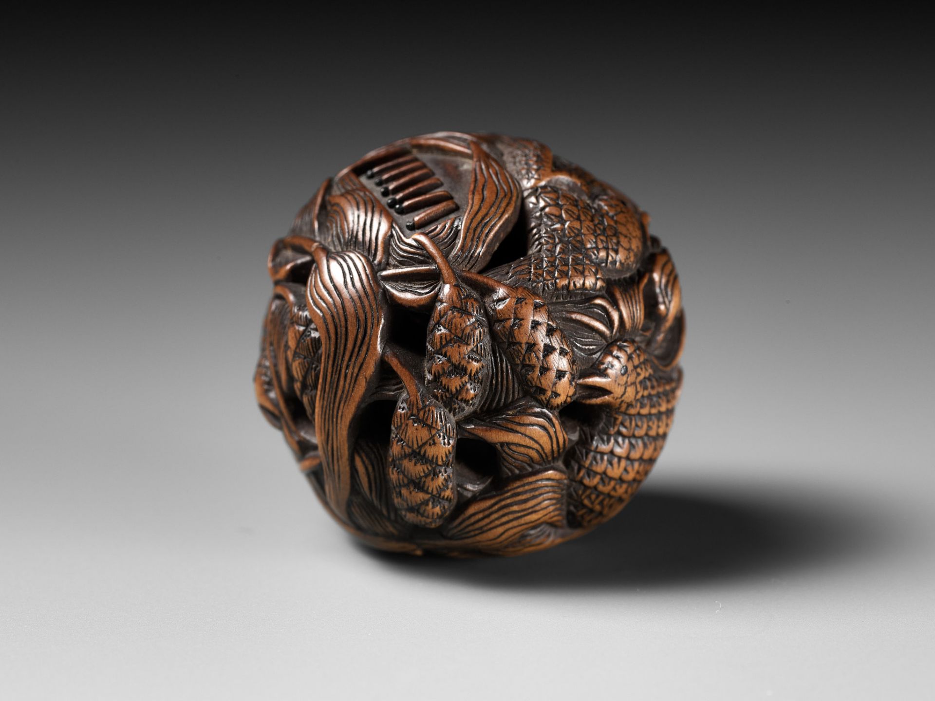 MASANAO: A FINE WOOD NETSUKE DEPICTING AN AUTUMNAL SCENE OF QUAILS AND MILLET - Image 8 of 14