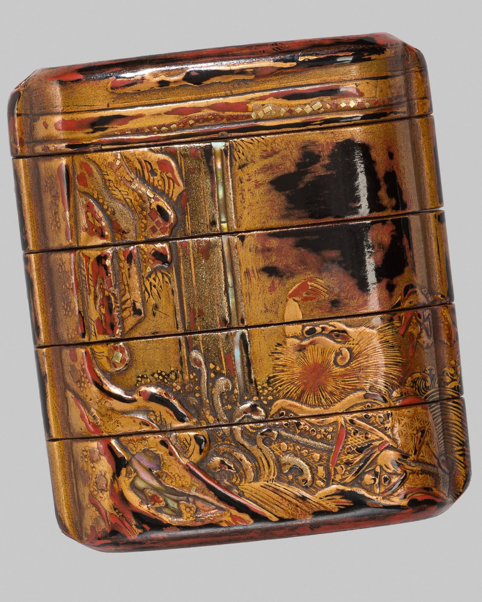 AN EARLY LACQUER FOUR-CASE INRO OF A DRUNKEN SHOJO