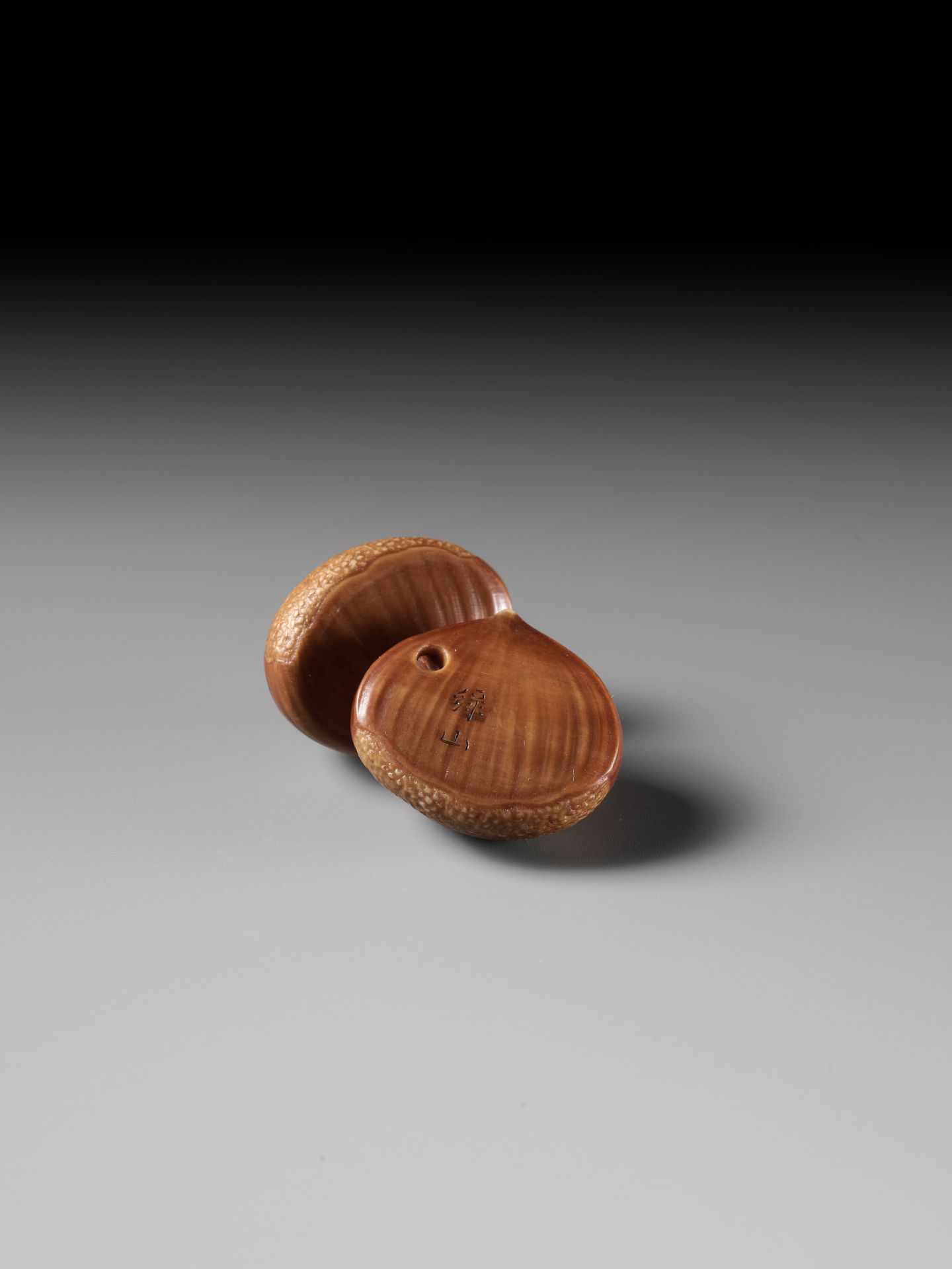 ANDO RYOKUZAN: A FINE LACQUERED IVORY NETSUKE OF TWO CHESTNUTS - Image 9 of 11