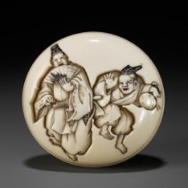 HOGYOKU: AN IVORY MANJU NETSUKE OF TWO MANZAI DANCERS