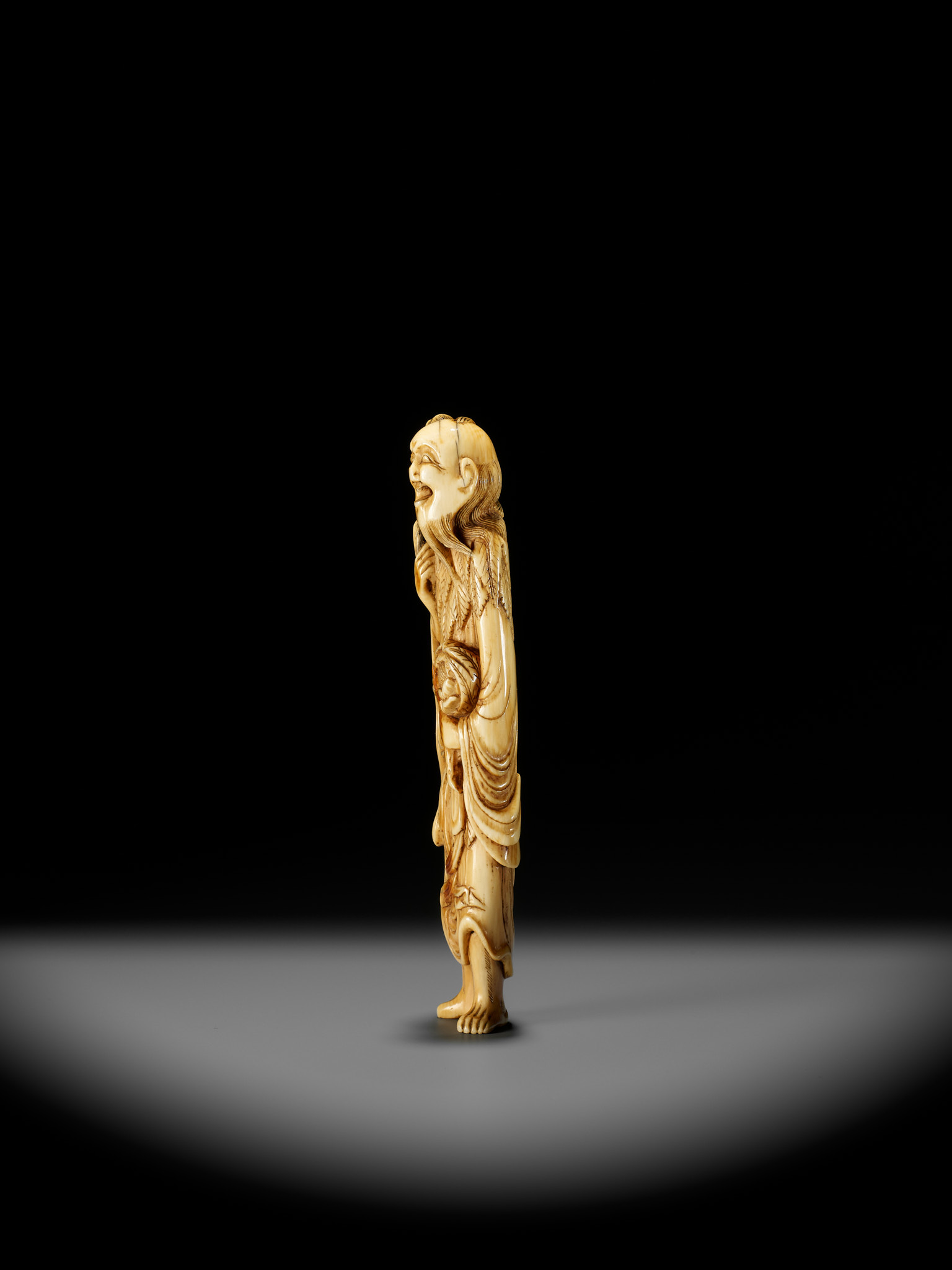 A SUPERB AND LARGE IVORY NETSUKE OF A SENNIN WITH A MONKEY - Image 9 of 13