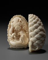 KAIGYOKU MASATSUGU: A FINE IVORY NETSUKE OF JO AND UBA INSIDE A PINECONE