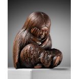 TADATOSHI: A SUPERB NAGOYA SCHOOL WOOD NETSUKE OF A SLEEPING SHOJO