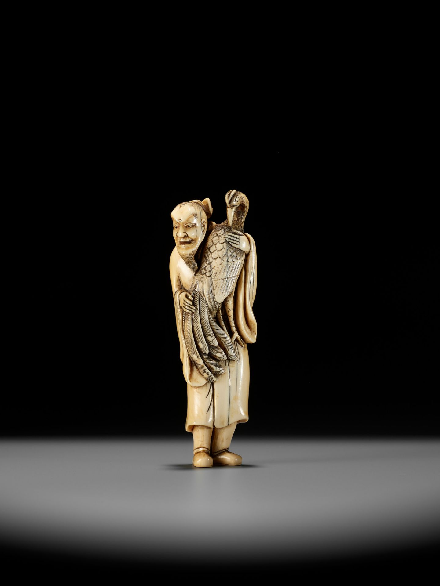 A VERY RARE AND LARGE IVORY NETSUKE OF BAIFUKU WITH HO-O BIRD - Bild 2 aus 16