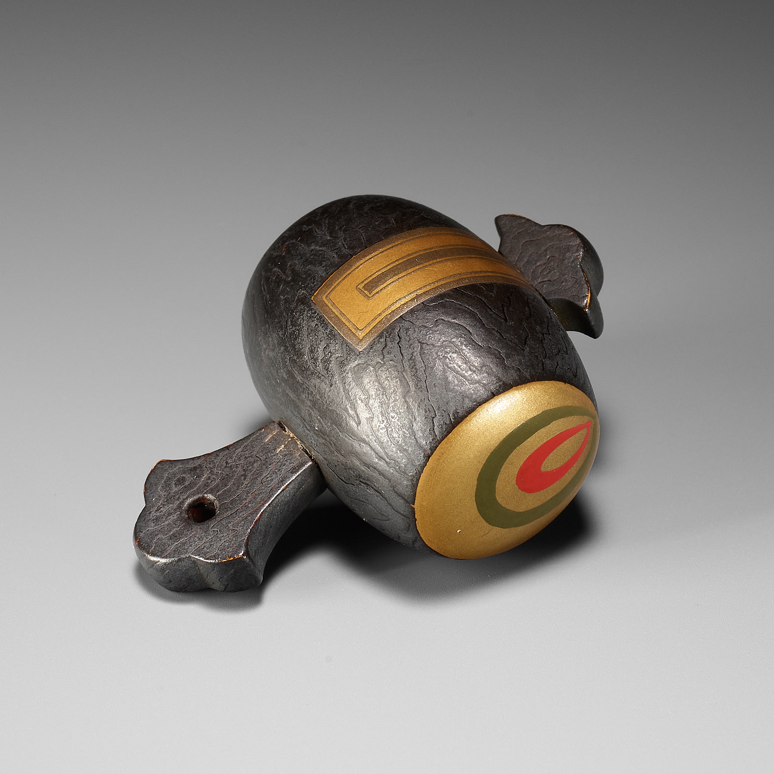 A LACQUERED WOOD NETSUKE OF DAIKOKU'S WISH-GRANTING MALLET, UCHIDE NO KOZUCHI