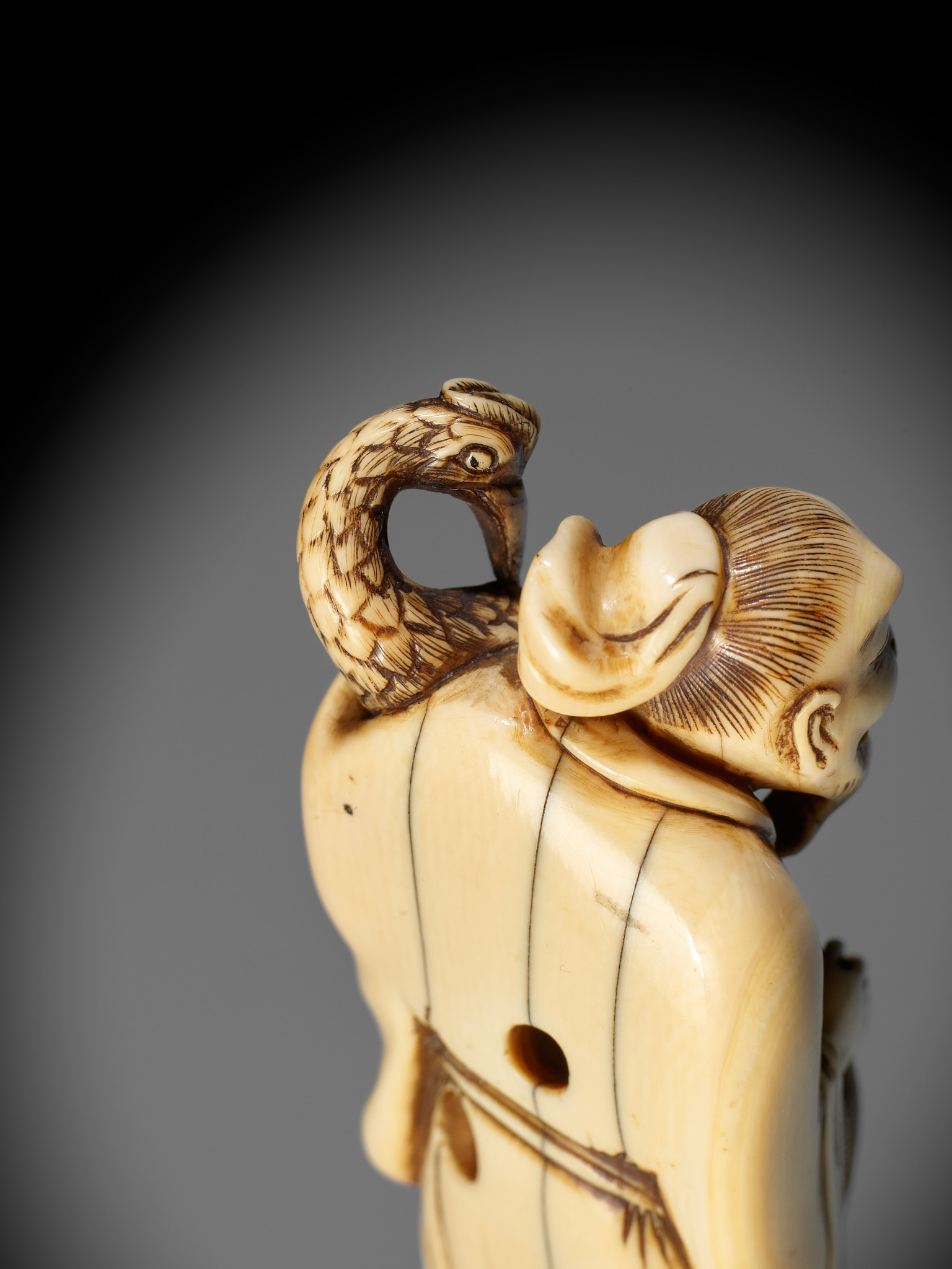 A VERY RARE AND LARGE IVORY NETSUKE OF BAIFUKU WITH HO-O BIRD - Image 3 of 16