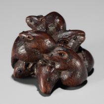 SARI: A FINE WOOD NETSUKE DEPICTING A MISCHIEF OF RATS