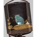 AN INLAID BLACK LACQUER FOUR-CASE INRO WITH AN OWL AND GOURDS