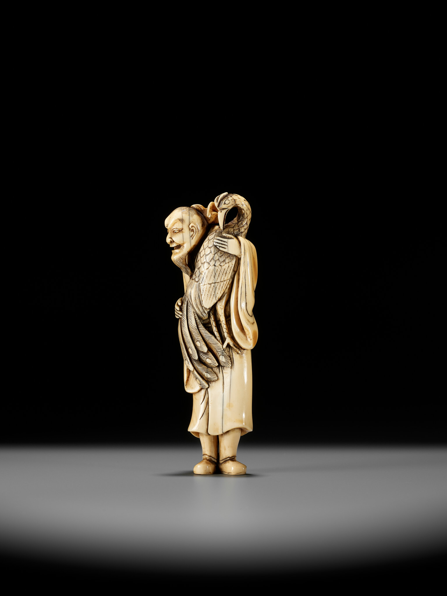 A VERY RARE AND LARGE IVORY NETSUKE OF BAIFUKU WITH HO-O BIRD - Image 8 of 16