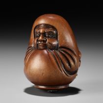 SHUMIN: A FINE INLAID WOOD NETSUKE OF A DARUMA DOLL