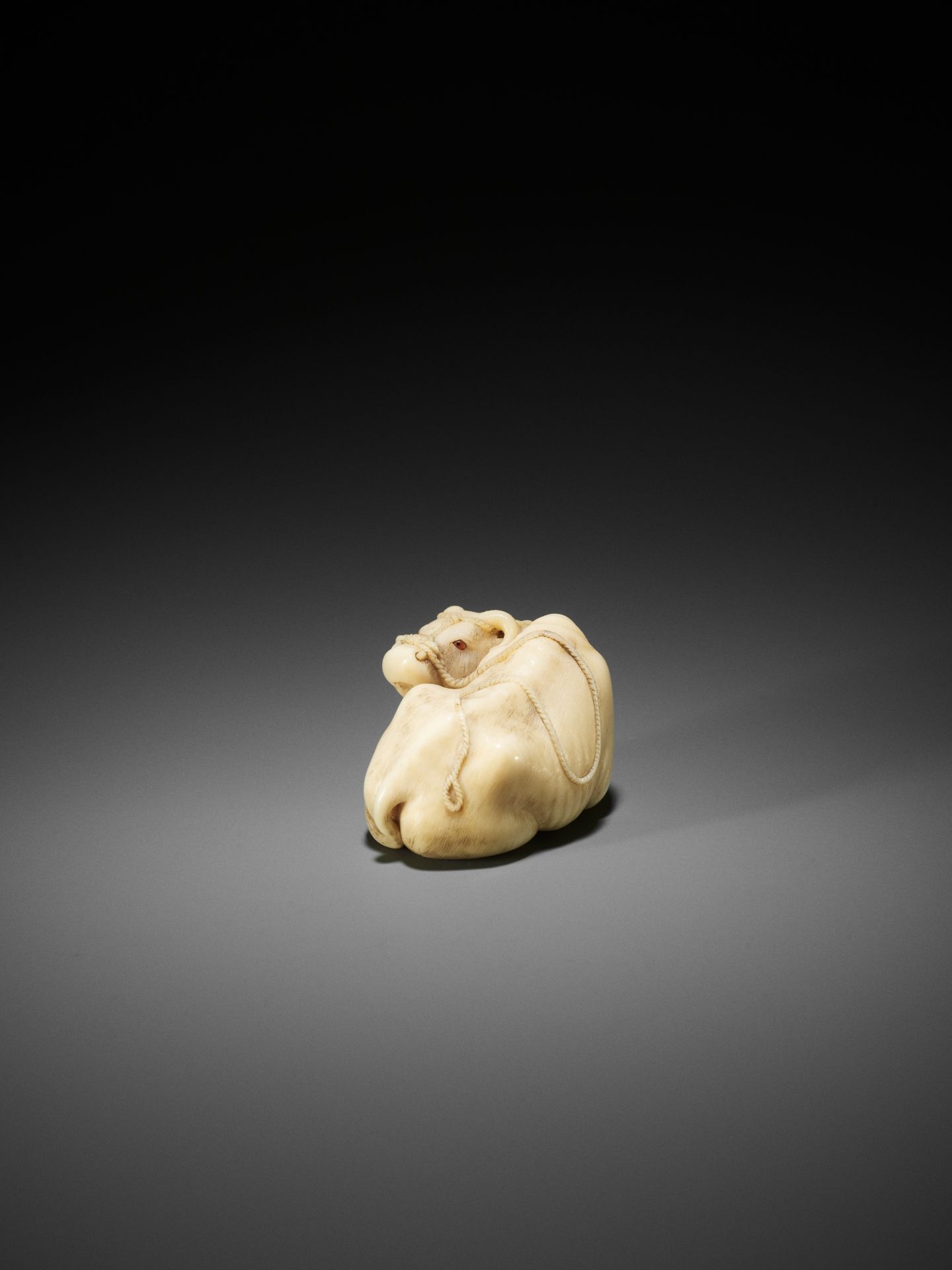 KAIGYOKUSAI MASATSUGU: A MASTERFUL AND IMPORTANT IVORY NETSUKE OF A RECUMBENT OX - Image 17 of 30