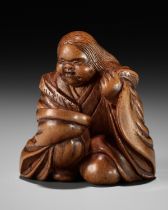 JOBUN: A VERY RARE WOOD NETSUKE OF OKAME WITH A SAKE SAUCER