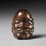 MASAYUKI: A FINE WOOD 'DOUBLE MASK' NETSUKE OF THE EBISU TYPE