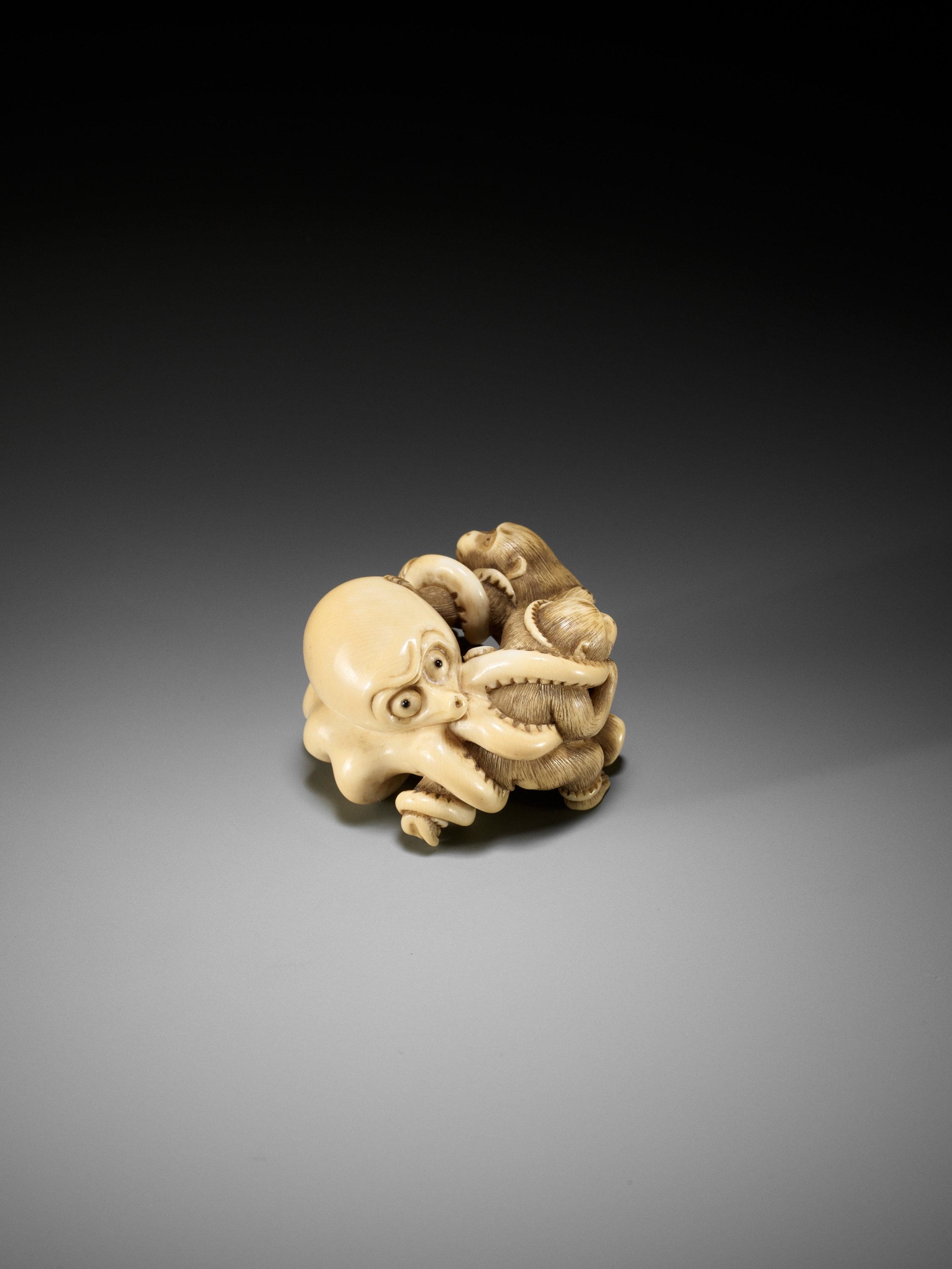 IKKOSAI: A SUPERB IVORY NETSUKE OF TWO MONKEYS FIGHTING AN OCTOPUS - Image 7 of 15