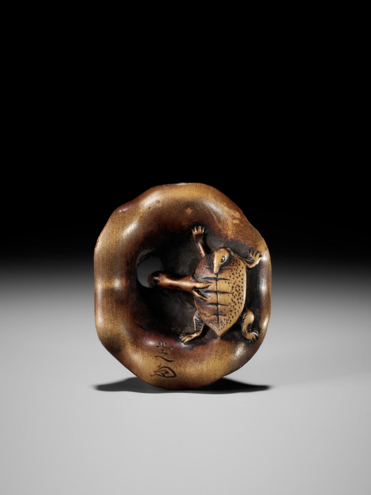 HOSHUNSAI MASAYUKI: A FINE WOOD NETSUKE OF AN ONI CATCHING A TERRAPIN - Image 2 of 13