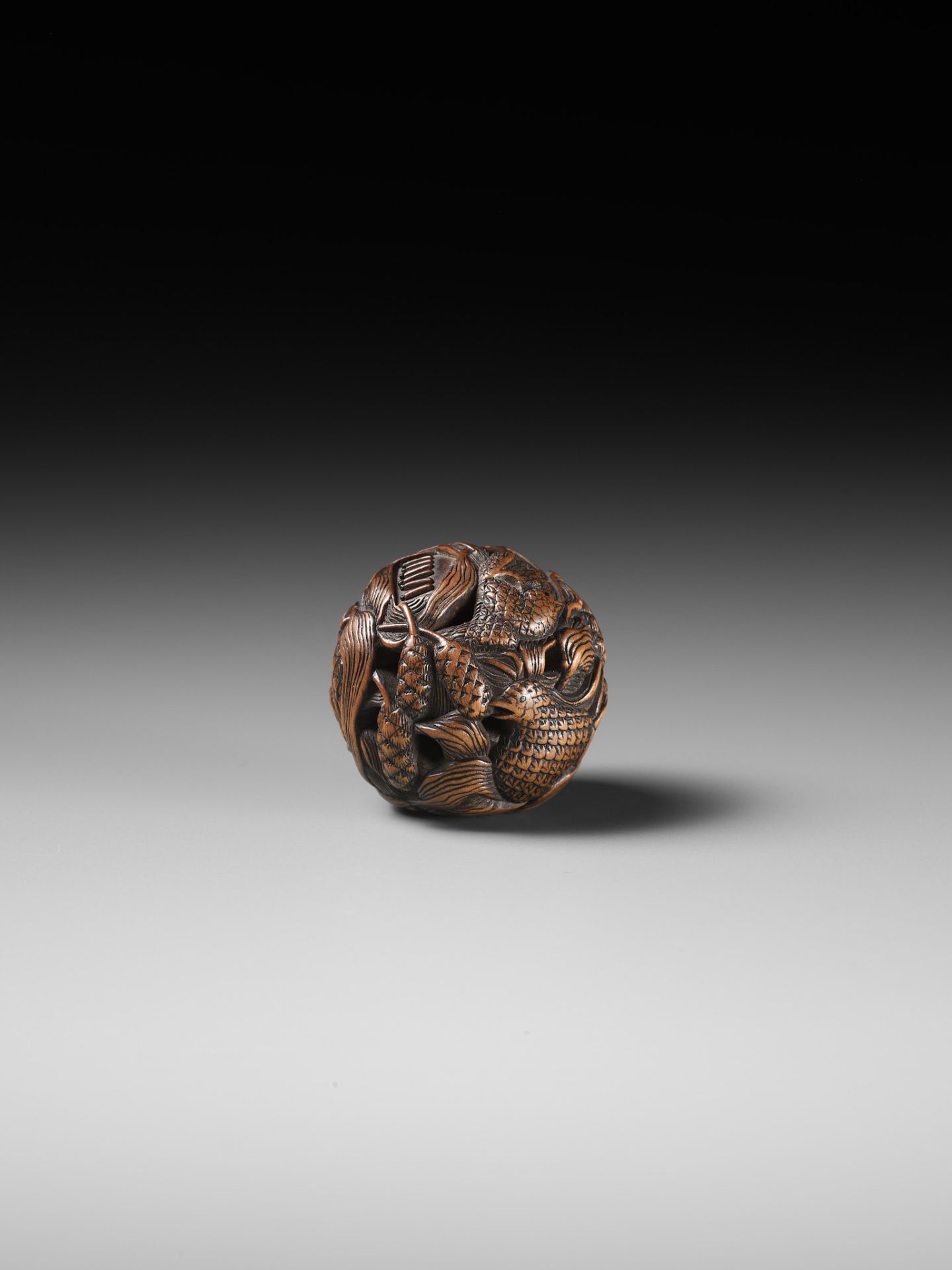 MASANAO: A FINE WOOD NETSUKE DEPICTING AN AUTUMNAL SCENE OF QUAILS AND MILLET - Image 3 of 14