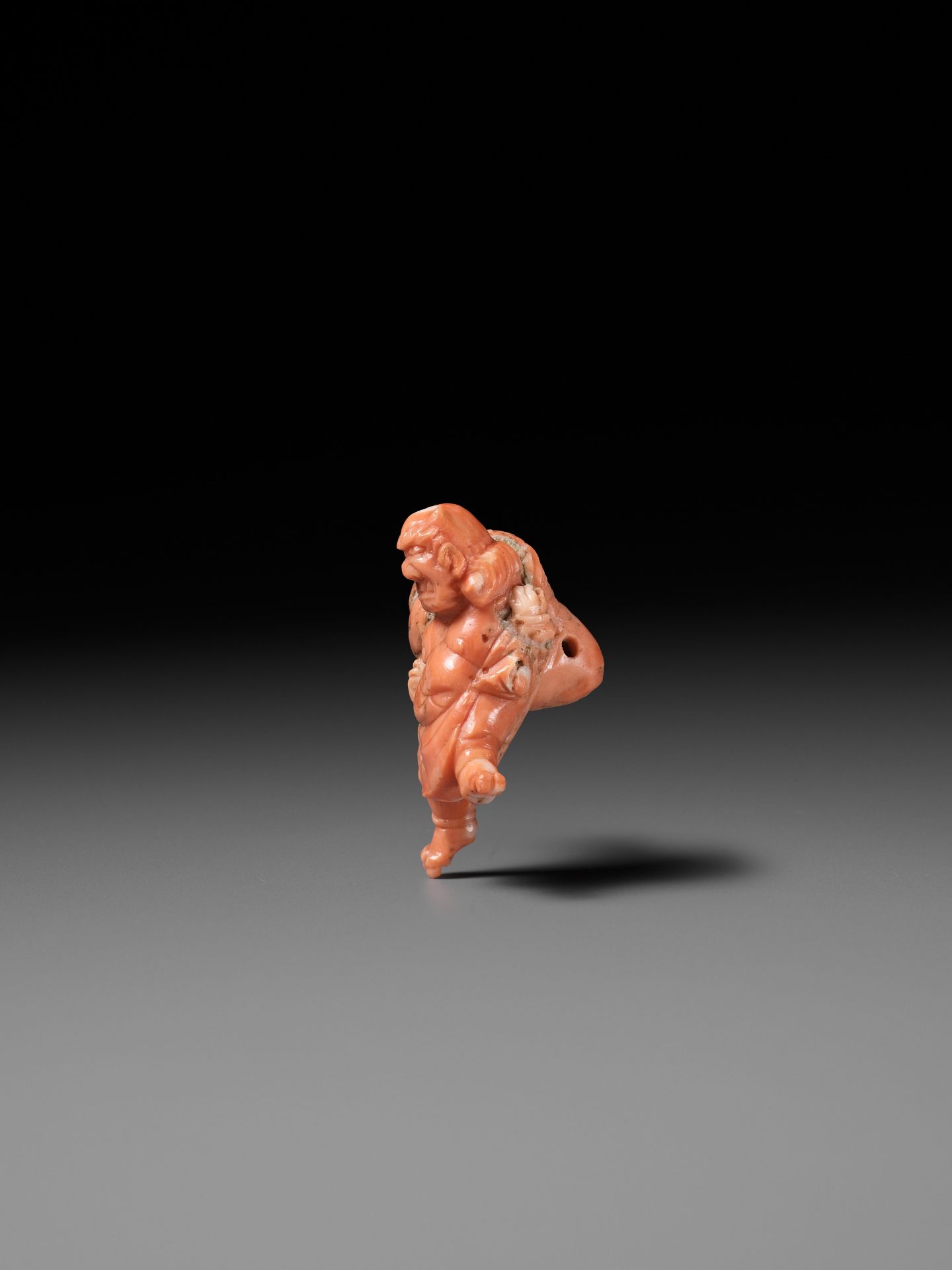 A VERY RARE SOLID CORAL NETSUKE OF FUJIN - Image 6 of 9