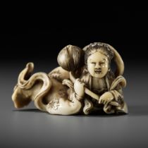 MINKOKU III: A FINE IVORY NETSUKE OF A TENNIN