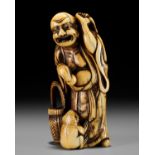 A FINE IVORY NETSUKE OF GAMA SENNIN