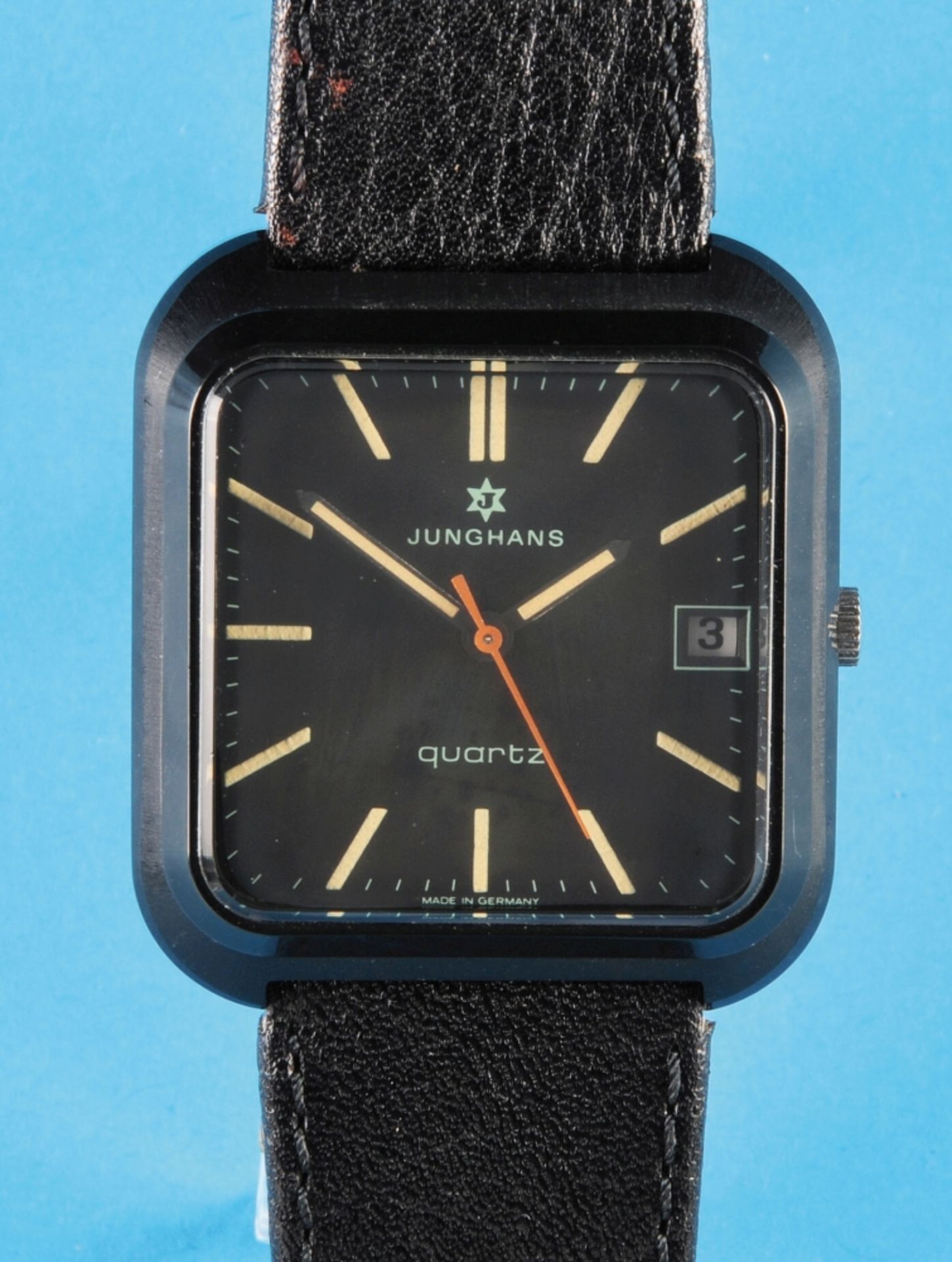 Junghans Quartz, square, black wristwatch with center second hand and date, steel pressure back,