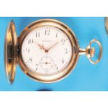 Waltham, gilt pocket watch with sprung cover, engine-turned case case with small monogram E.W.,