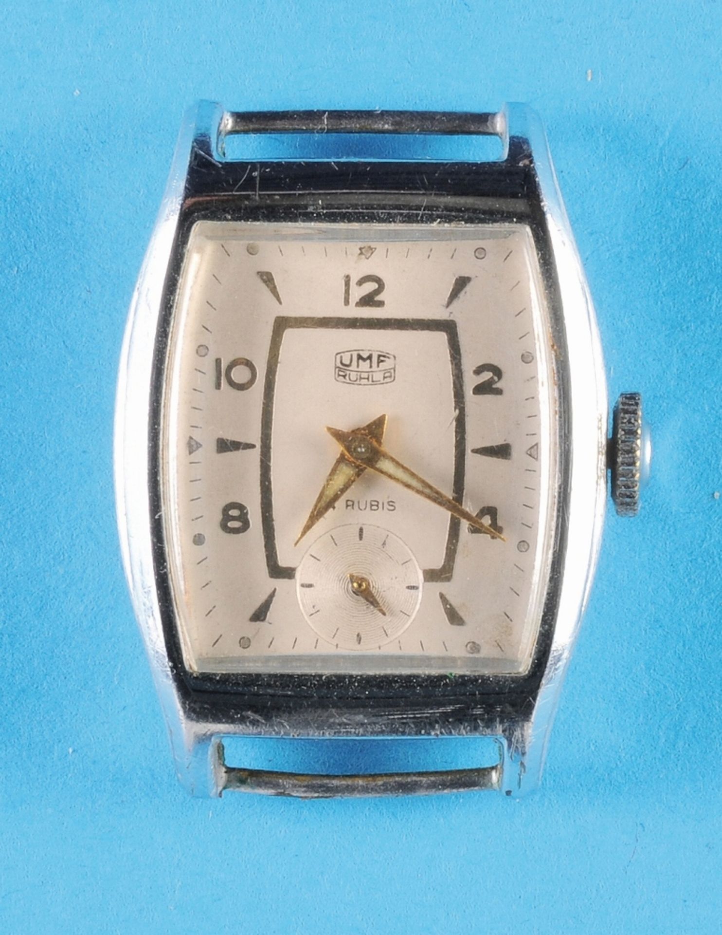 UMF Ruhla, tonneau-shaped chrome-plated case, silvered dial with gilt hour markers and Arabic numera