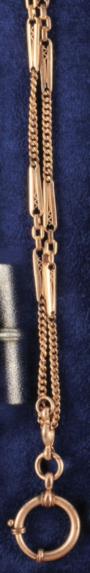 Thin, gold-plated pocket watch chain,