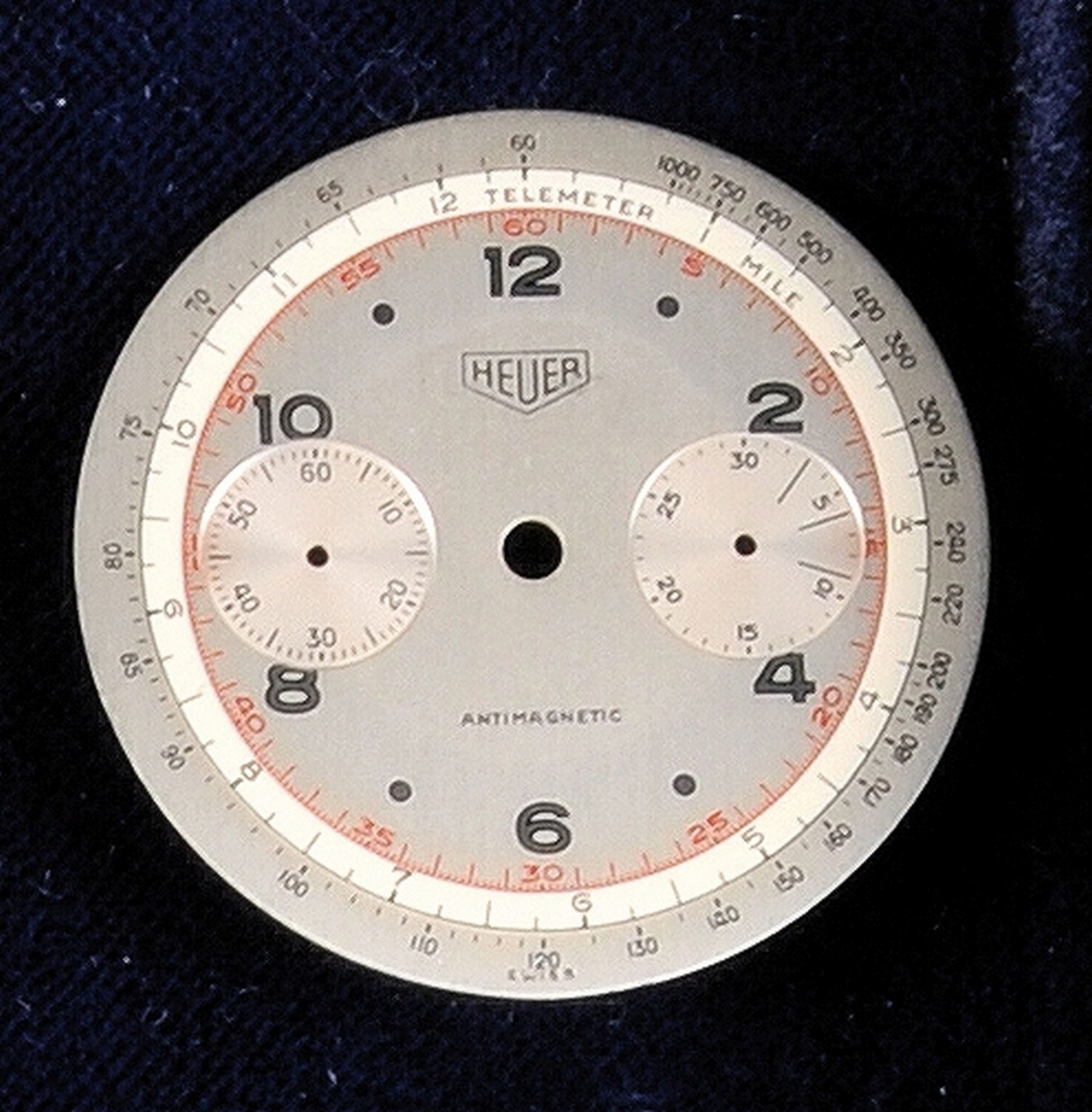 Heuer Antimagnetic, silver-plated dial with tachymeter and Telemeter Scale,