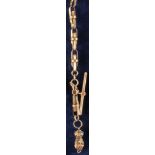 Gold-plated pocket watch chain with decorated hand as a pendant,
