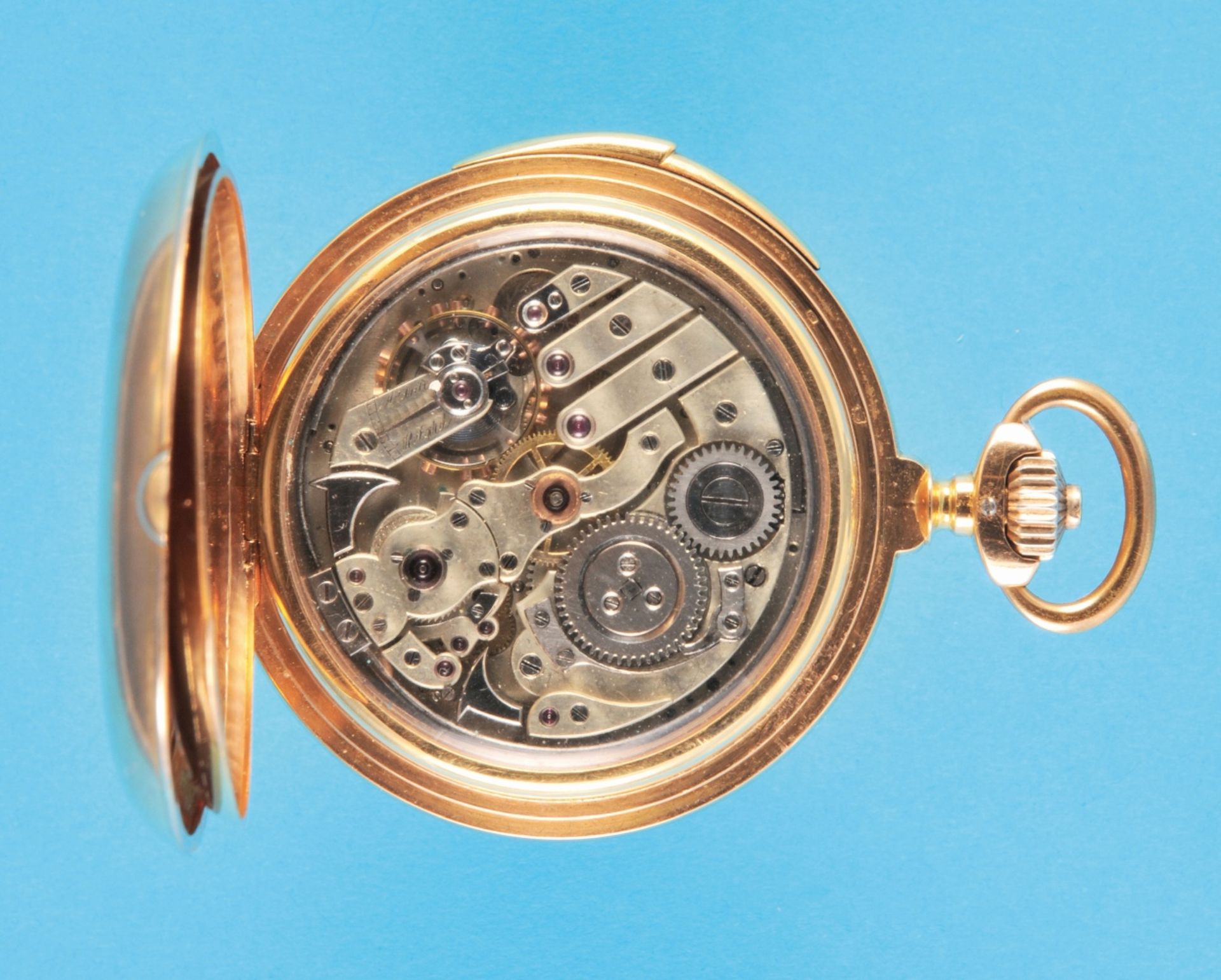 Astronomical gold pocket watch with sprung cover, minute repeater and moon phase calendar, on cuvett