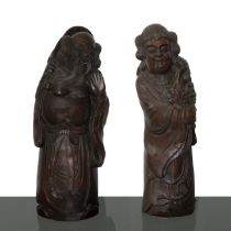 Pair of bamboo wood sculptures depicting a man and a woman