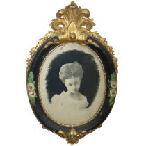 Oval frame with gold decorations and print, nineteenth century