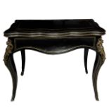 Napoleon III folding game table in black ebonized wood with brass and gilt bronzes, nineteenth centu