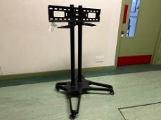 Mobile Television Stand. Please Note: Auction Location - Bay Studios, Fabian Way, Swansea SA1 8QB.
