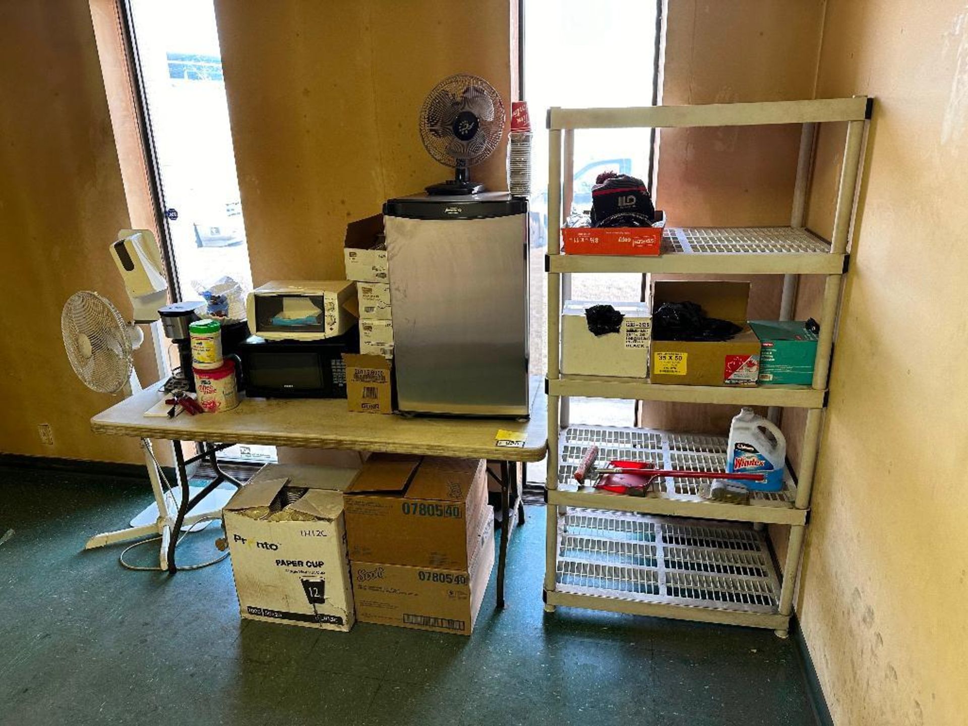 Contents of Lunchroom Including Microwave, Fridge, Shelf, Folding Table, Fan, Garbage Bags, etc.