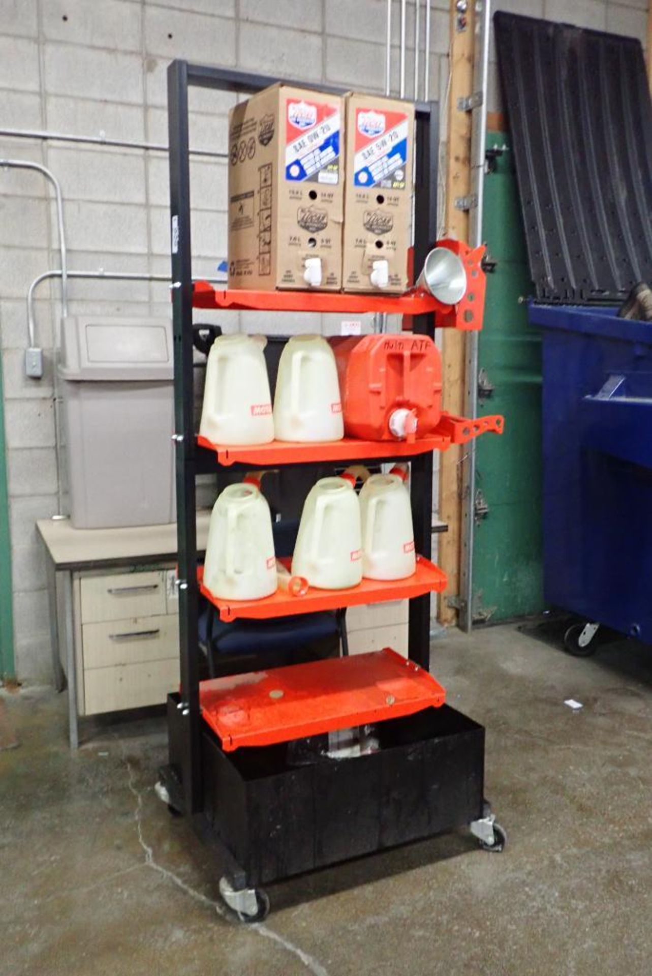 Double Sided 4-tier Mobile Cart w/ Drip Tray, Jugs and Oil.
