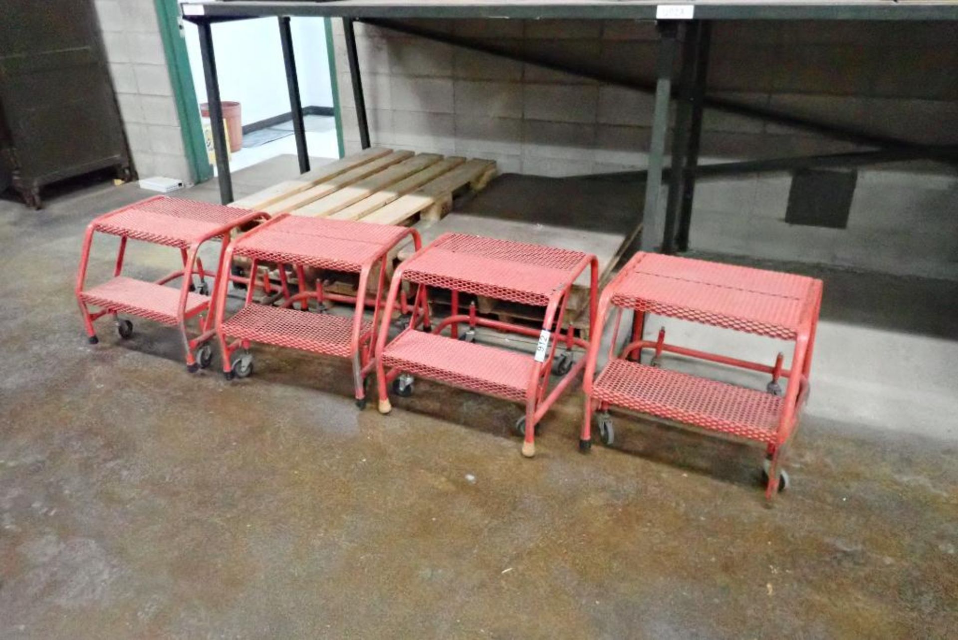 Lot of (4) Mobile Warehouse Steps. **BEING USED FOR LOADOUT, NO REMOVAL UNTIL 12PM MAY 7/24*